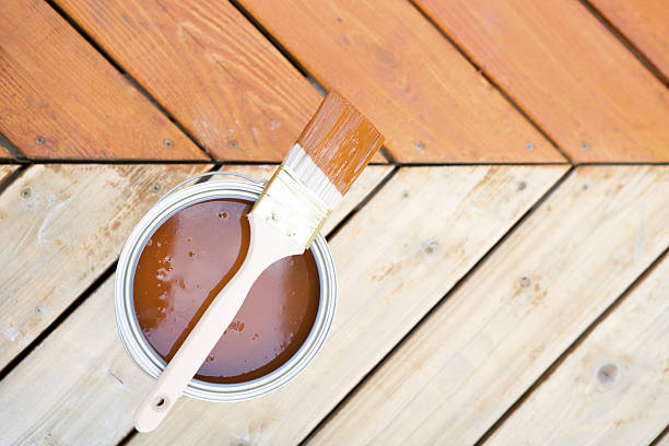 Staining hardwood patio deck stock photo