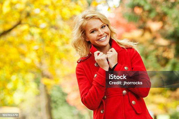 Attractive Young Woman In Red Fall Fashion Coat Stock Photo - Download Image Now - Autumn, Coat - Garment, Headshot