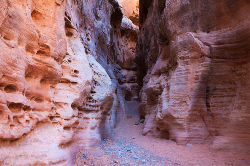 Slot canyon with blue and red stones, Valley of Fire State Park, Nevada, USA.