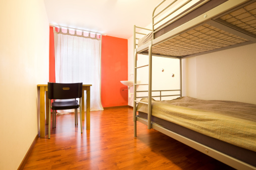 Hostel dorm room with bunk bed