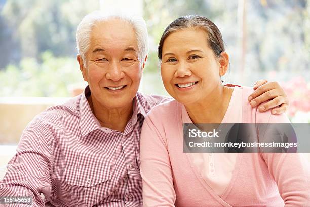 Senior Asian Couple At Home Stock Photo - Download Image Now - Asian and Indian Ethnicities, Couple - Relationship, Senior Adult