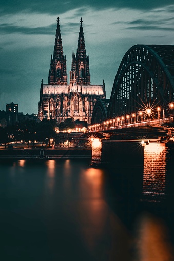 Night photo of the famous Cathedral in Cologne, bridge