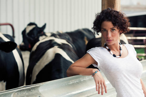 istock Brunette woman posing with livestock 155146407