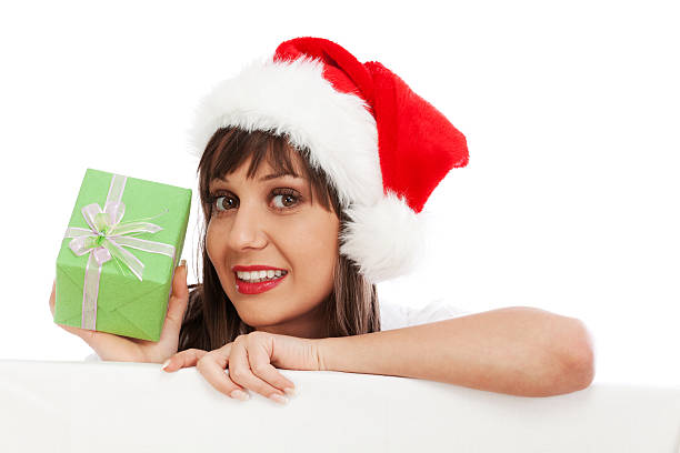 istock Young woman with santa hat and christmas gift 155146417