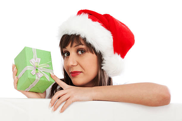 istock Young woman with santa hat and christmas gift 155146418