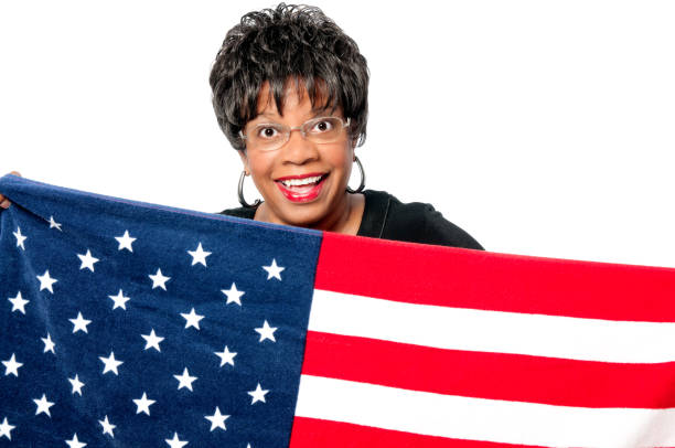 istock Woman Holding an American Flag 155146556