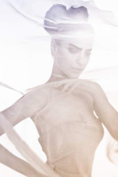 istock Beauty covered with transparent flowing textile 155147286