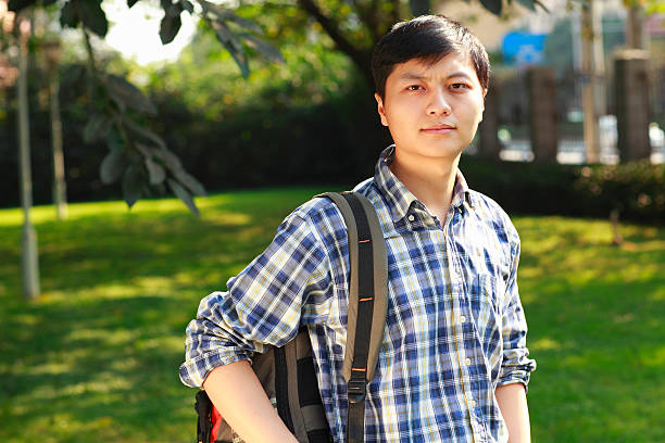 istock portrait of one young asian man 155147334