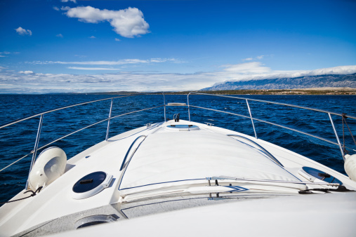 Foredeck of modern yacht during drive.