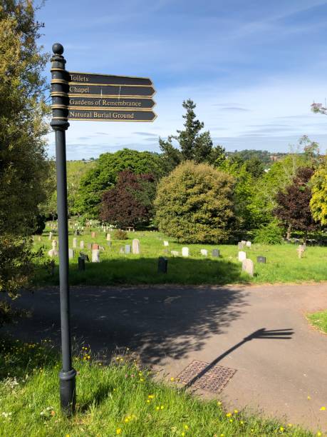 istock Exwick cemetery - old sign post and surrounding area 1551477032