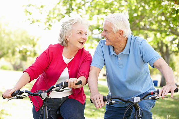 istock Senior couple riding bikes 155147766