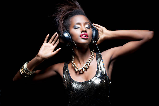 istock Woman listening to music 155147971
