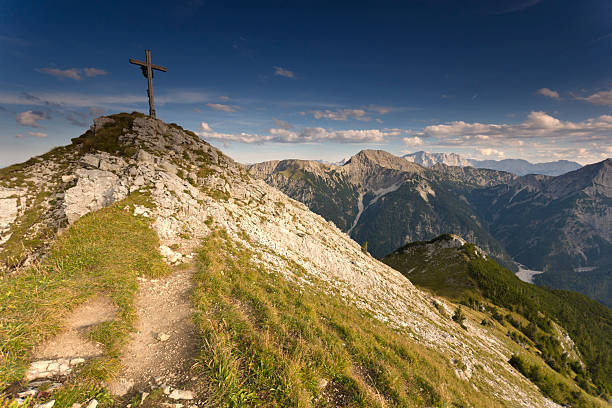istock Cross on mountain summit in Bavaria 155148076