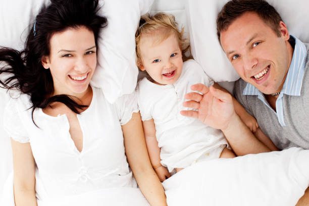 istock Young family in bed 155148104