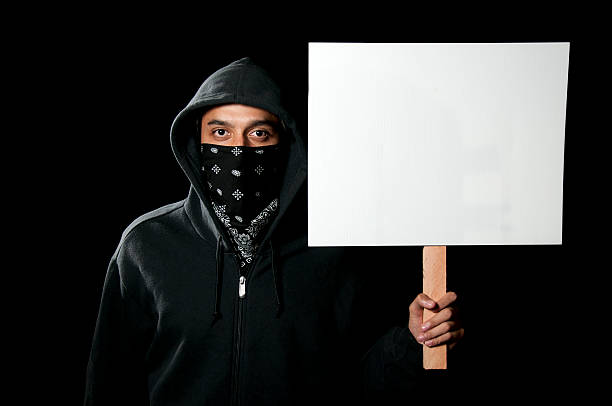 Protestor Holding Blank Sign stock photo