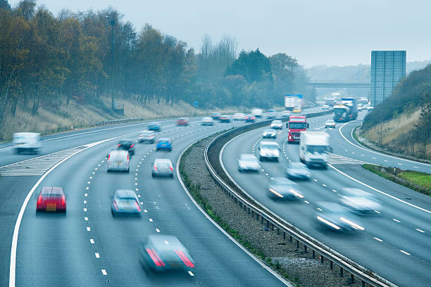 istock Fast traffic on foggy motorway 155148808