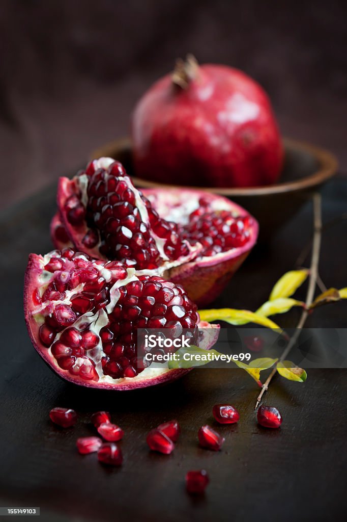 Pomegranate still life Pomegranate still life with low key lighting Pomegranate Stock Photo