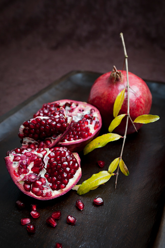 Pomegranates still life with reverse copy space