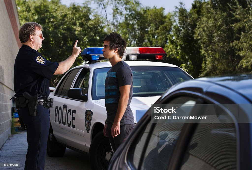 DUI Investigation Stock photo of a man being given the horizontal gaze nystagmus test in a DUI investigation. Drunk Driving Stock Photo