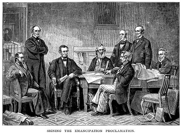 Lincoln Signs Emancipation Proclamation Engraving From 1882 Showing Abraham Lincoln Signing The Emancipation Proclamation Which Ended Slavery. us president stock illustrations