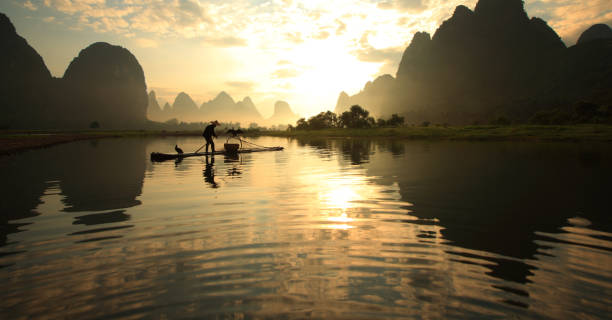istock Lijiang fishermen 155149419