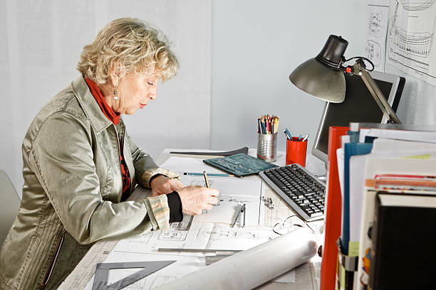 istock Mature Woman Working at Desk 155149436