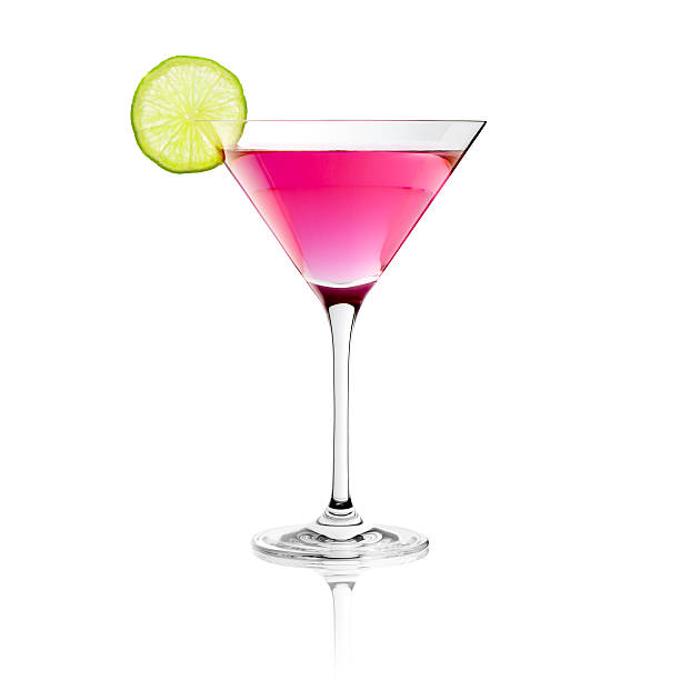 Classic Cosmopolitan Drink with Lime Decoration - Cocktail Glass Martini stock photo