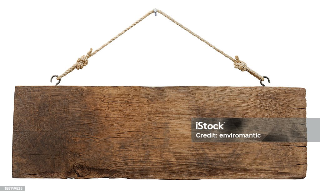 Old weathered wood signboard. Old weathered wood signboard, hanging by old rope from a nail, isolated on white, clipping path included. Wood - Material Stock Photo