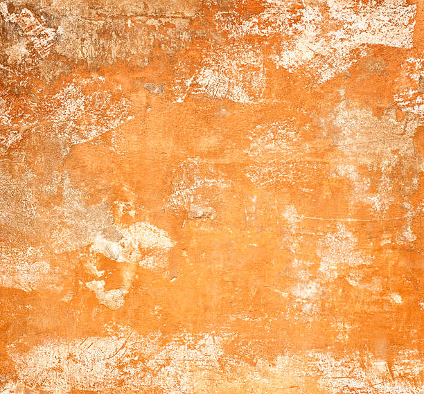 Rough Terracotta Surface Close-up of a heavily weathered and scratched terracotta surface, taken in Rome, Italy. adobe material stock pictures, royalty-free photos & images