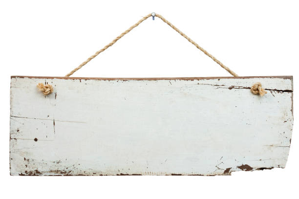 istock Old weathered white wood signboard. 155149554
