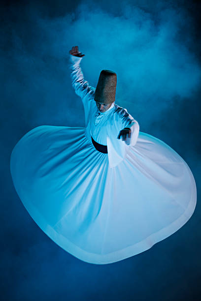 Whirling dervish Whirling dervish (Blurred motion) mevlana stock pictures, royalty-free photos & images