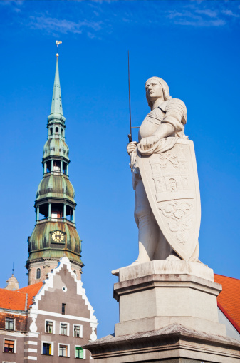 Statue Of Roland (Dedicated In 1896) With The House Of The Blackhead's And St. Peter's Church In The Background
