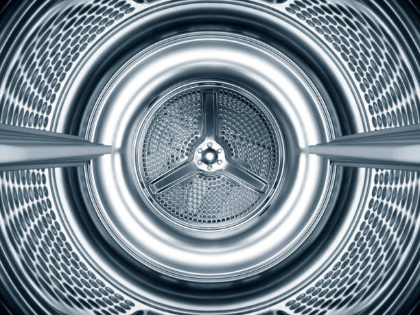 inside the steel drum of a washing machine - santrifüj stok fotoğraflar ve resimler