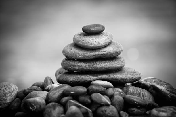 Stone composition on the beach in BW.