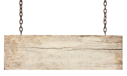 Old piece of white weathered wood signboard hanging by rusty chains, isolated on white,clipping path included.