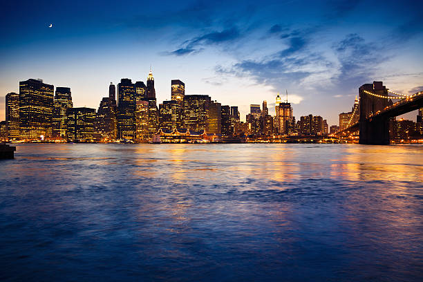 istock Manhattan Brooklyn Bridge Illuminated Night Skyline 155150297