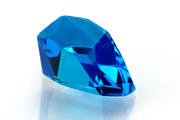 Topaz or Aquamarine on white background.