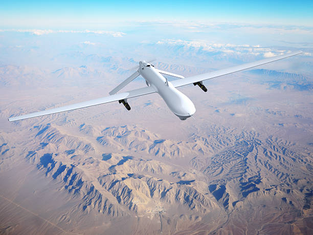 Unmanned Aerial Vehicle (UAV) Unmanned Aerial Vehicle (UAV), also known as Unmanned Aircraft System (UAS). Digitally Generated Image with my own photo as background iran stock pictures, royalty-free photos & images