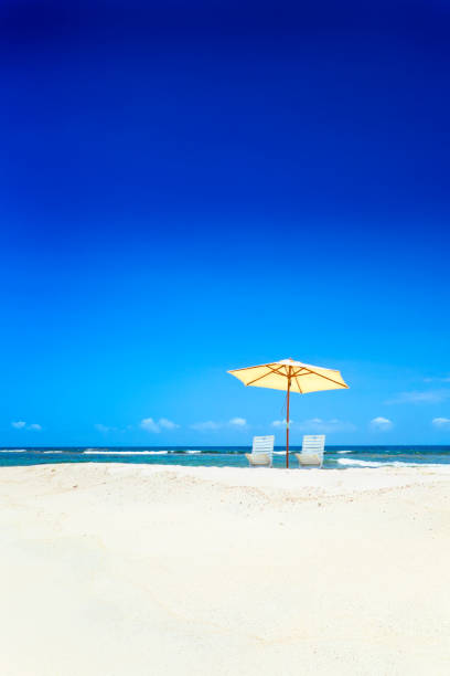 istock Summer tropical white sand beach with umbrella and chairs 155150862