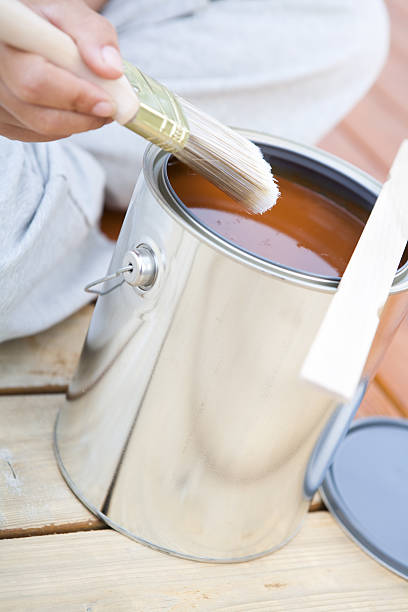 istock Getting ready to stain hardwood patio deck 155150866