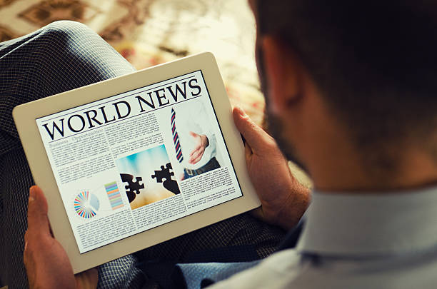 istock Reading a digital Newspaper on contemporary Tablet 155150947