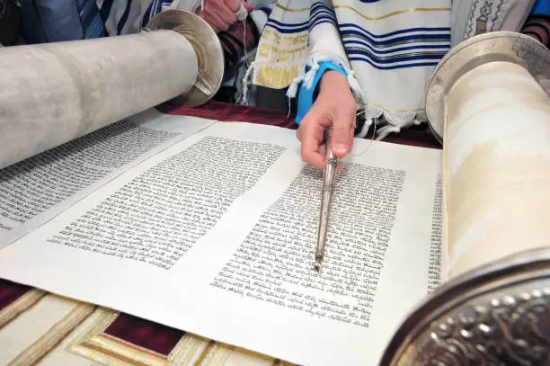 A Bar Mitzvah boy reads from the Torah at the Wailing Wall in Jerusalem Israel