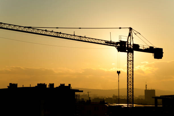 Silhouette of Harbor crane during sunset.
