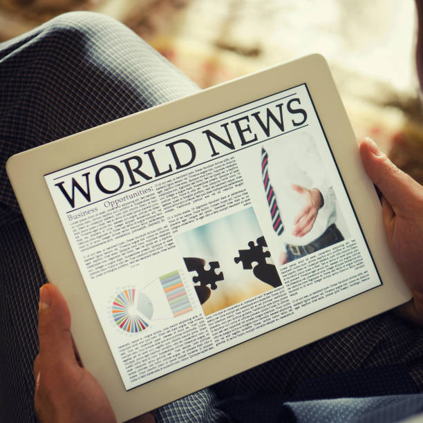 istock Reading a digital Newspaper on contemporary Tablet 155151437