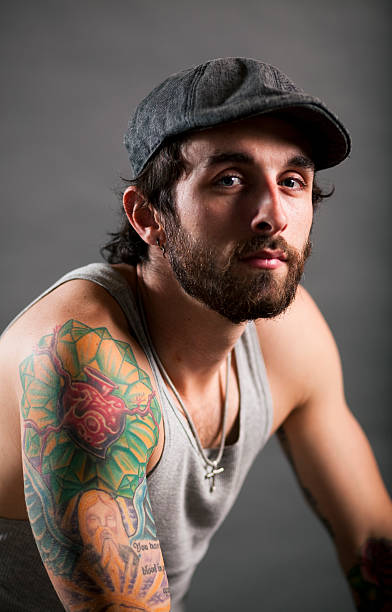 istock Portrait of a serious tattooed man 155151681