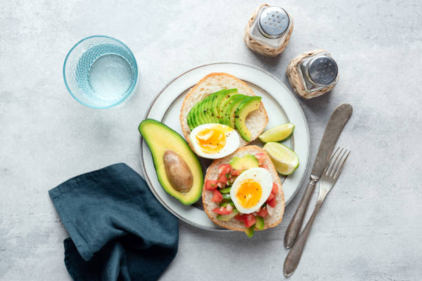 istock Healthy breakfast meal with avocado and egg 1551517246