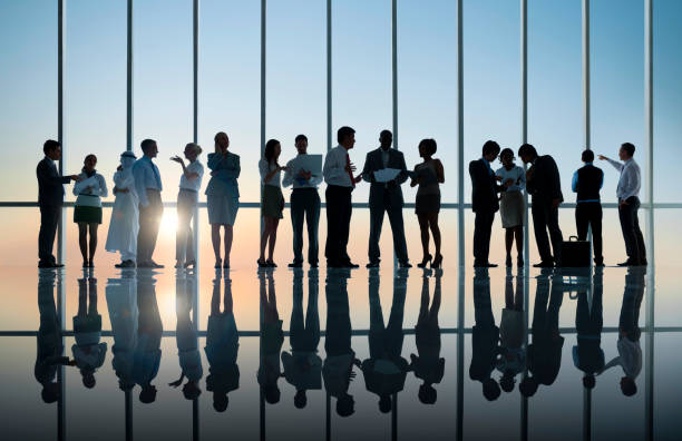 istock Diverse business people working in a busy office. 155151900