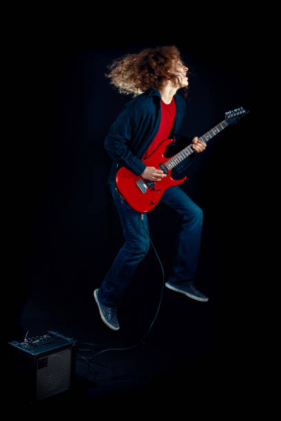 istock Teenager playing guitar 155152477