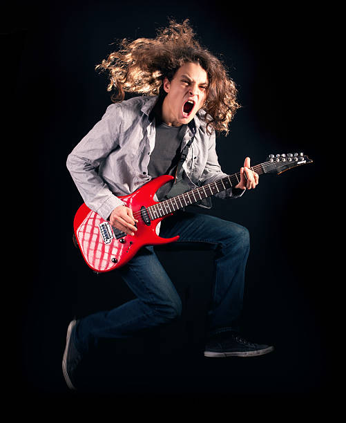istock Teenager playing guitar 155152505