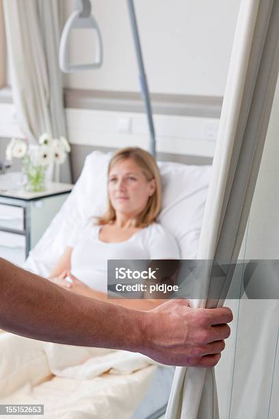 Closing Curtain Around Patient In Hospital Bed Stock Photo - Download Image Now - Privacy, Patient, Hospital